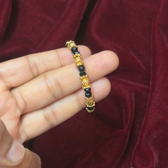 KIDS GOLD PLATED BLACK AND GOLD BEADED BRACELET (KD041)