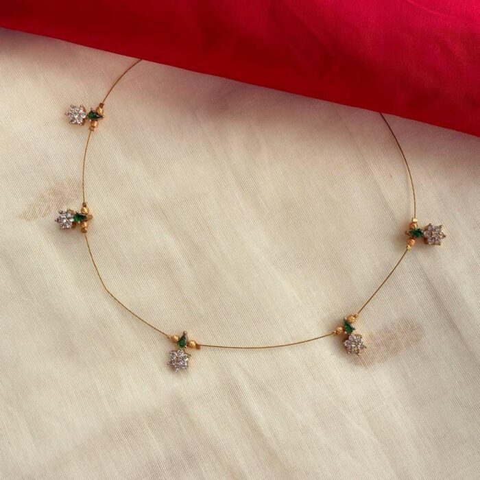 WHITE FLOWER WITH GREENSTONE INV008